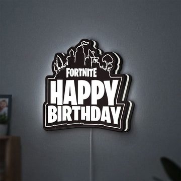 Fortnite LED lightbox hanging on a wall with white glow