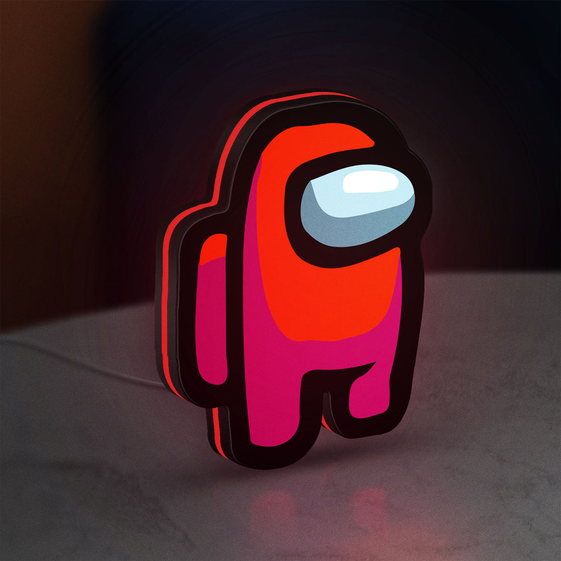 Among Us LED lightbox hanging on a wall with red glow