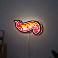 Hot Wheels Flame Racing Car LED lightbox hanging on a wall with yellow glow