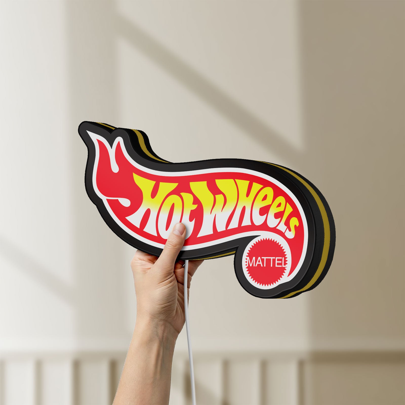 Unlit Hot Wheels Flame Racing Car LED lightbox held by hand to show size and details