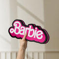 Unlit Barbie LED lightbox held by hand to show size and details