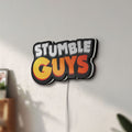 Unlit Stumble Guys LED lightbox mounted on a wall in daylight