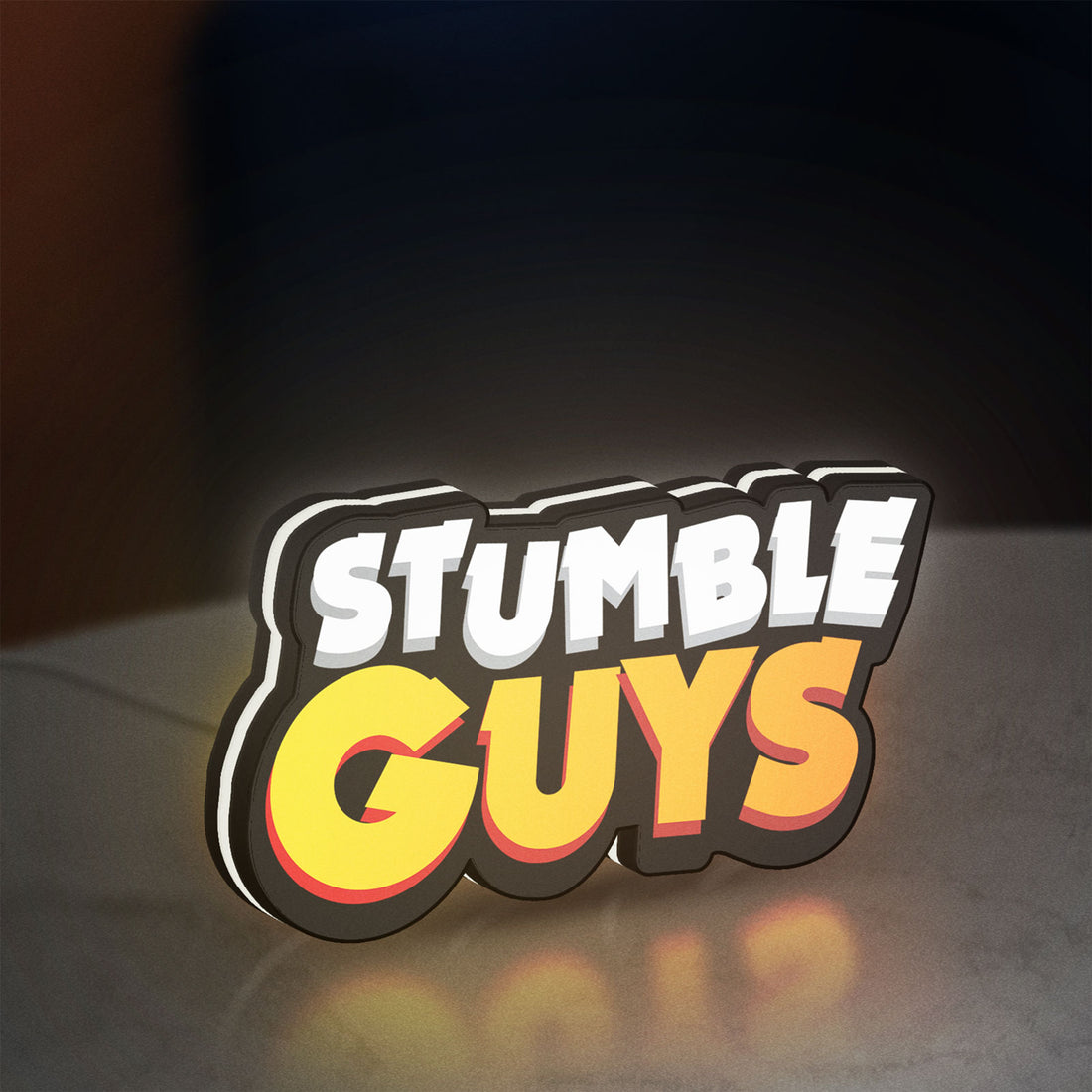 Stumble Guys LED lightbox hanging on a wall with white glow