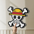 Unlit One Piece Mugiwara Flag LED lightbox held by hand to show size and details