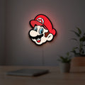 Super Mario LED lightbox hanging on a room wall with soft white light