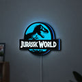 Jurassic World Dinosaur LED lightbox hanging on a wall with blue glow