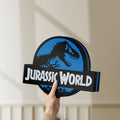 Unlit Jurassic World Dinosaur LED lightbox held by hand to show size and details