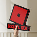 Unlit Roblox LED lightbox held by hand to show size and details