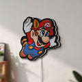 Unlit Super Mario Bros 3 LED lightbox mounted on a wall in daylight