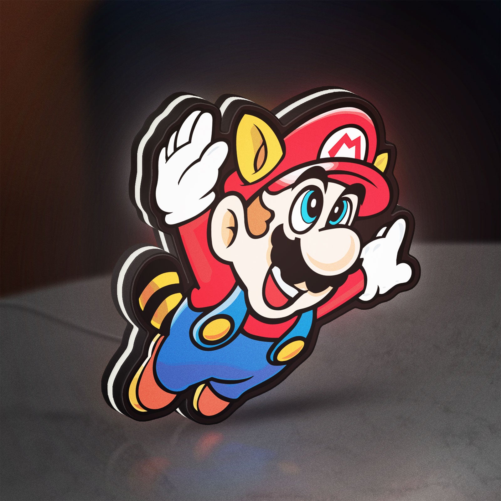 Super Mario Bros 3 LED lightbox standing on a desk from an angled side view with white glow