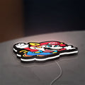 Super Mario Bros 3 LED lightbox lying flat on a desk with white glow