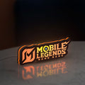 Mobile Legends LED lightbox standing on a desk from an angled side view with orange glow