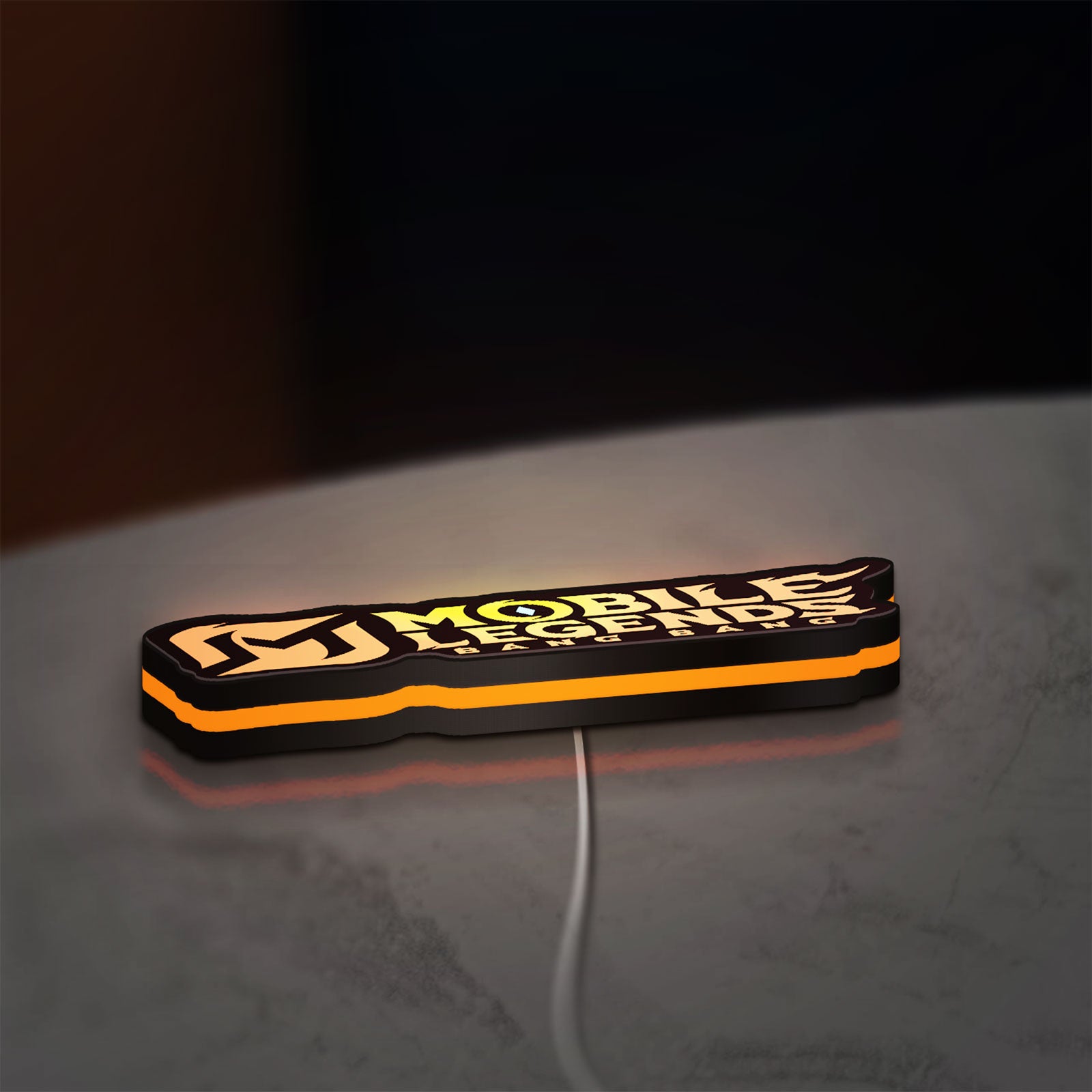 Mobile Legends LED lightbox lying flat on a desk with orange glow