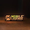 Front view of Mobile Legends LED lightbox sign glowing on a wooden desk