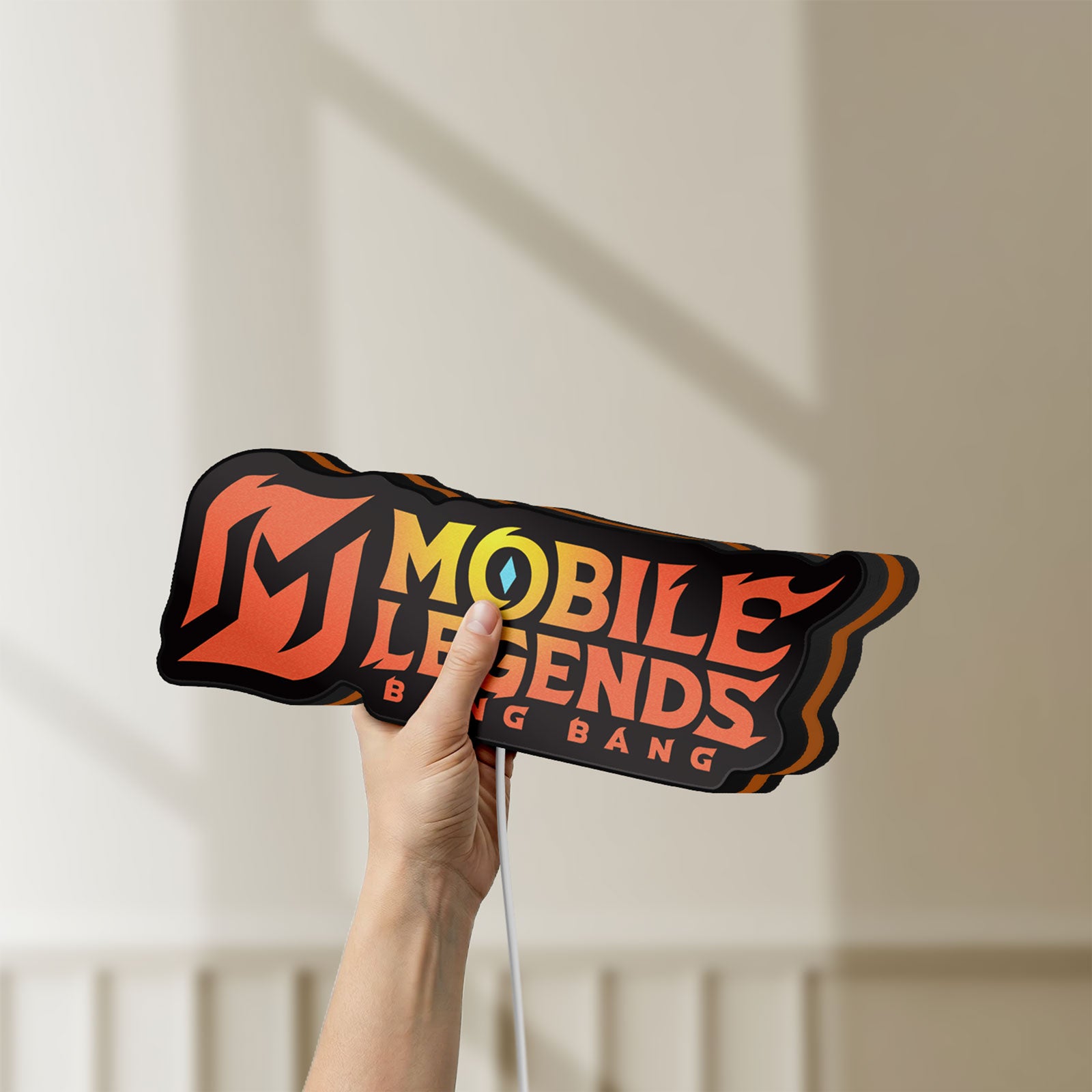 Unlit Mobile Legends LED lightbox held by hand to show size and details