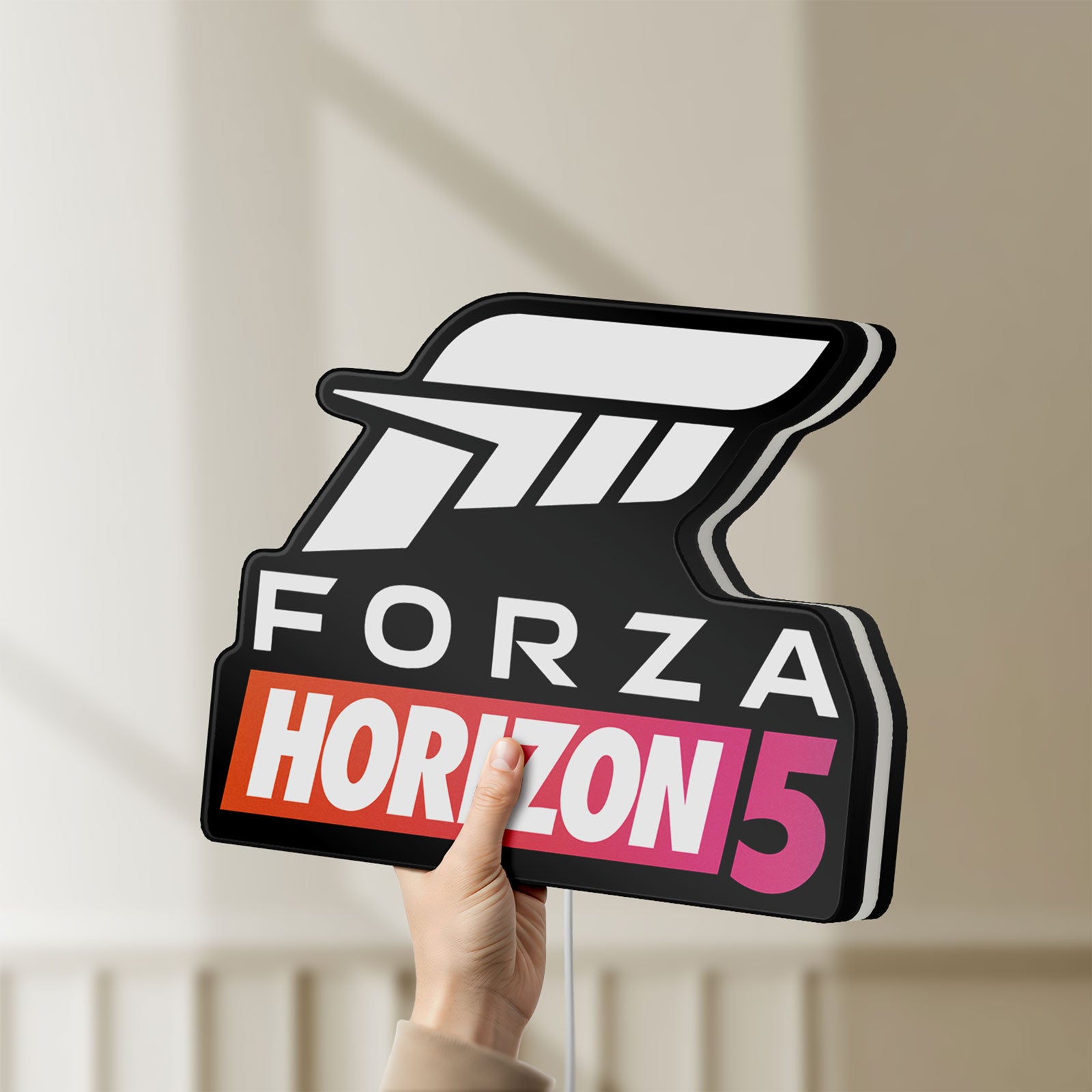 Unlit Forza Horizon 5 LED lightbox held by hand to show size and details