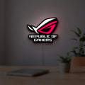 Republic Of Gamers New LED lightbox hanging on a room wall with soft white light