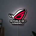 Republic Of Gamers New LED lightbox hanging on a wall with white glow