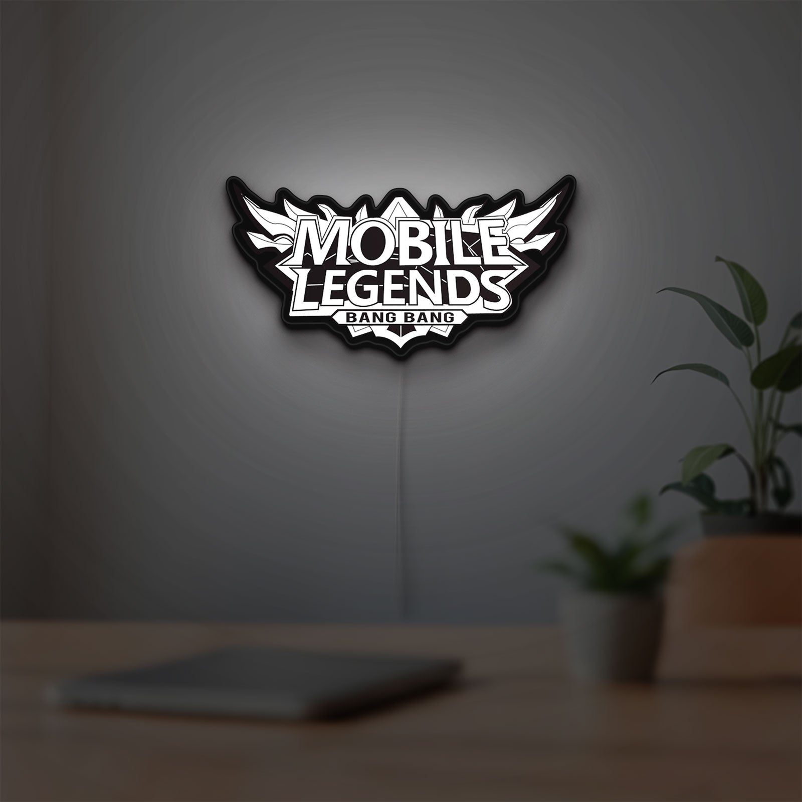 Mobile Legends Bang Bang LED lightbox hanging on a room wall with soft white light