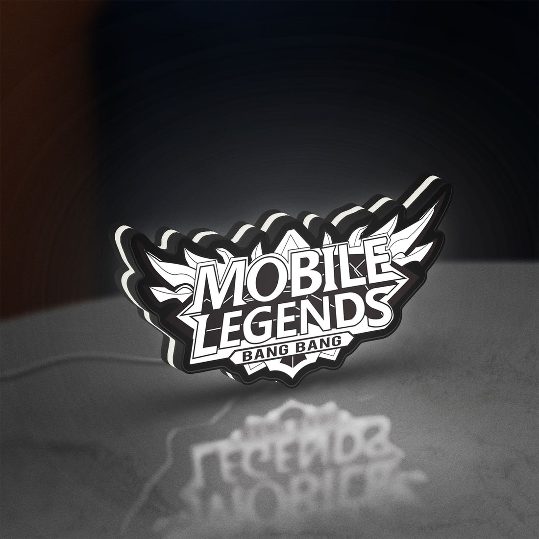 Mobile Legends Bang Bang LED lightbox hanging on a wall with white glow