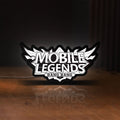 Front view of Mobile Legends Bang Bang LED lightbox sign glowing on a wooden desk