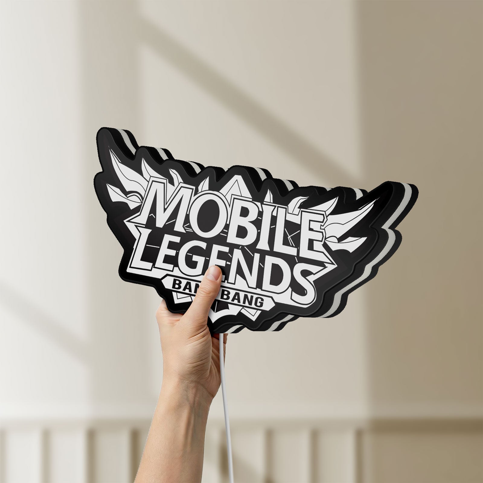 Unlit Mobile Legends Bang Bang LED lightbox held by hand to show size and details