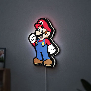 Super Mario LED lightbox hanging on a wall with white glow
