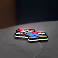 Super Mario LED lightbox lying flat on a desk with white glow