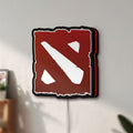 Unlit Dota LED lightbox mounted on a wall in daylight