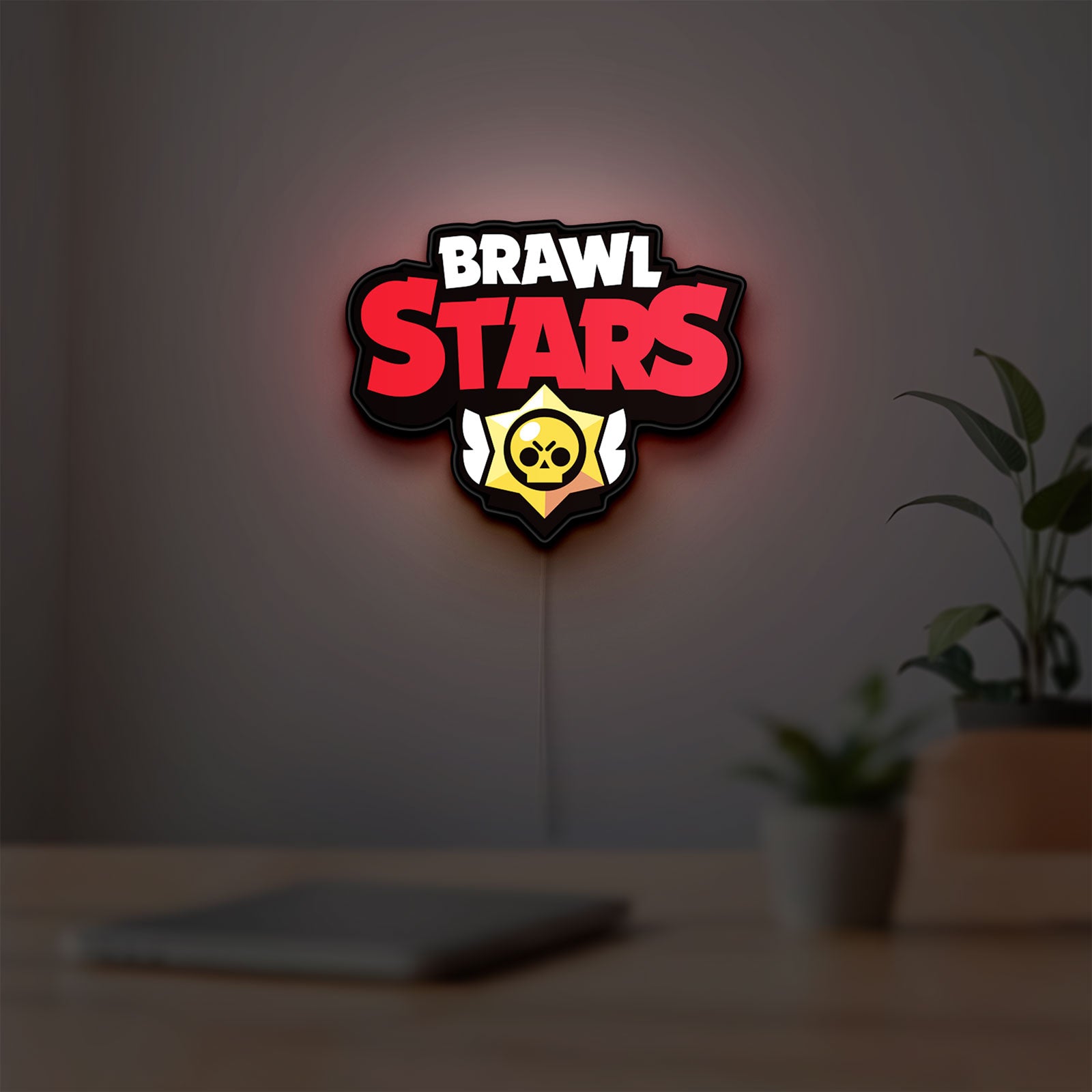 Brawl Stars LED lightbox hanging on a room wall with soft yellow light