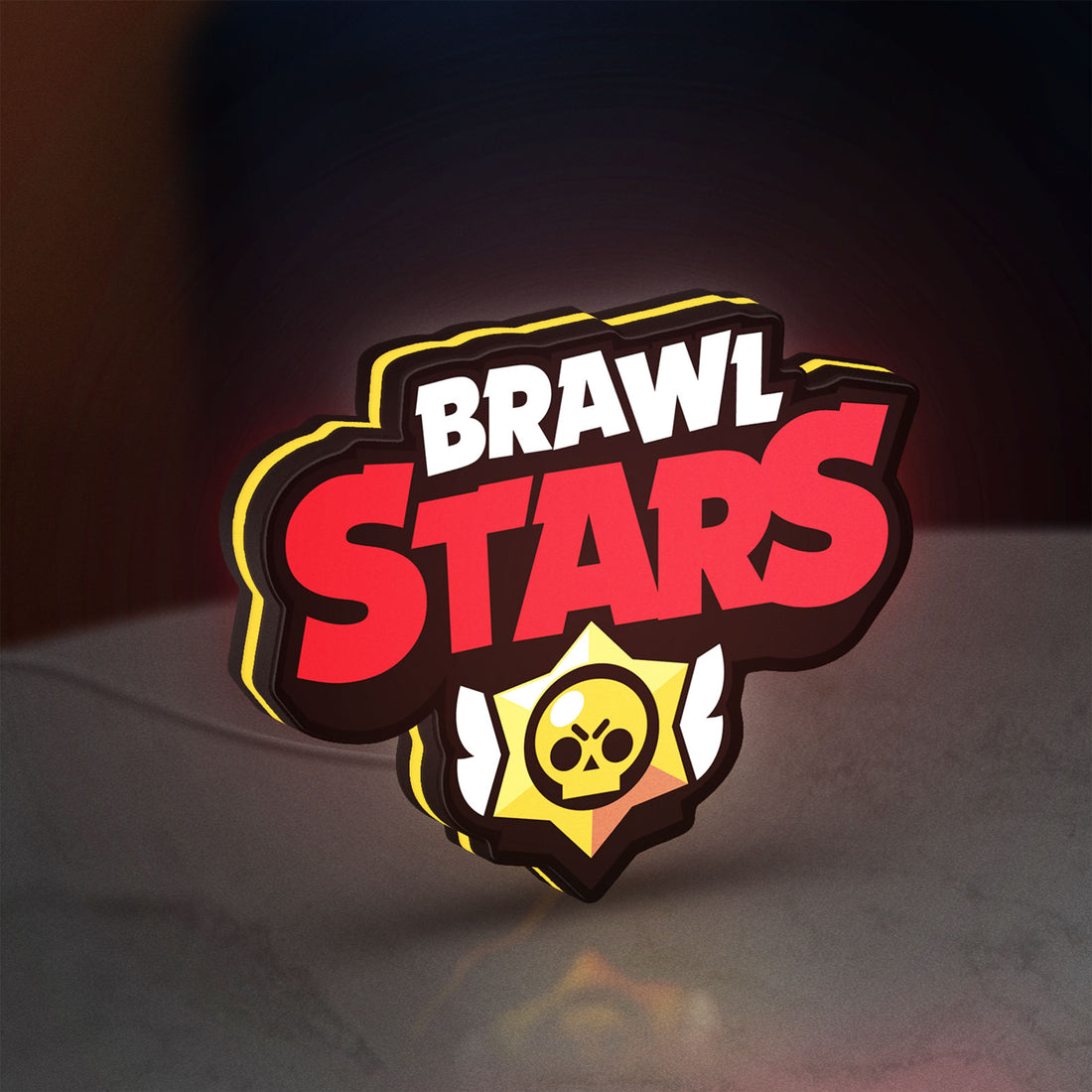 Brawl Stars LED lightbox hanging on a wall with yellow glow