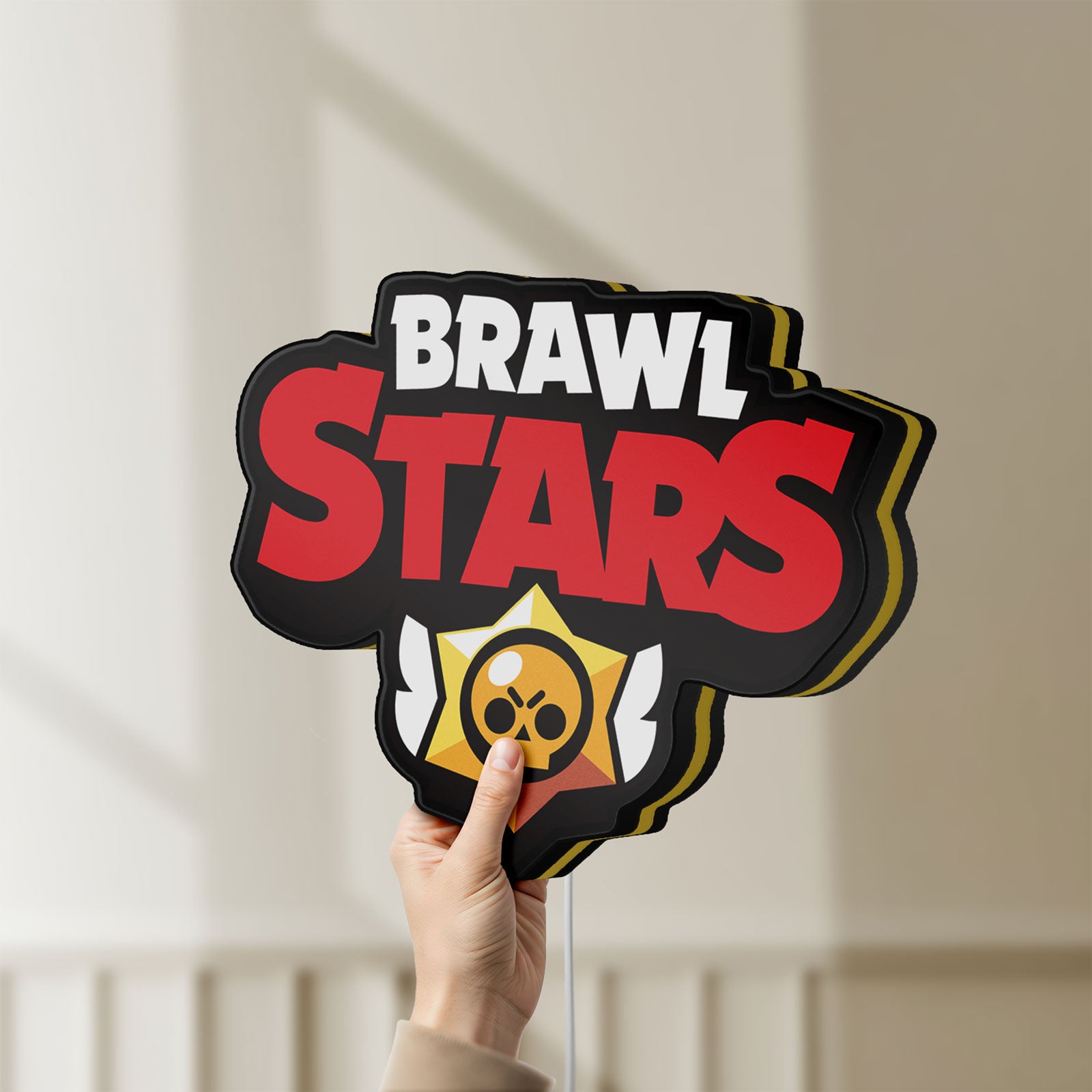 Unlit Brawl Stars LED lightbox held by hand to show size and details
