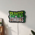 Unlit Plants vs Zombies LED lightbox mounted on a wall in daylight