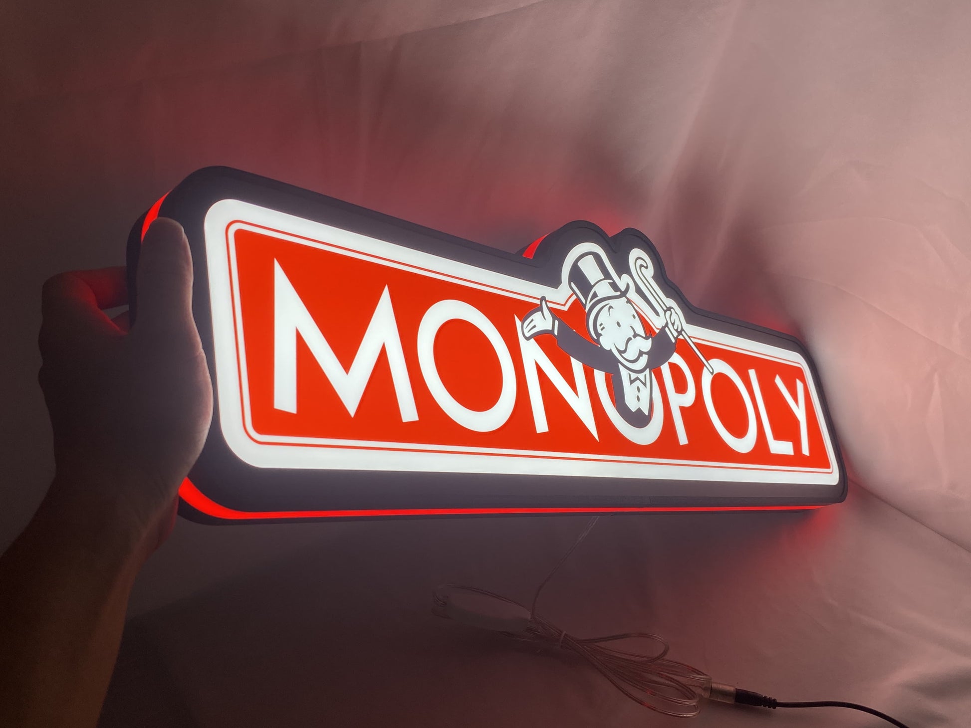 Monopoly Money Bag LED Sign (60cm) - Illuminated handheld size reference, unique wall art for desk and room decor