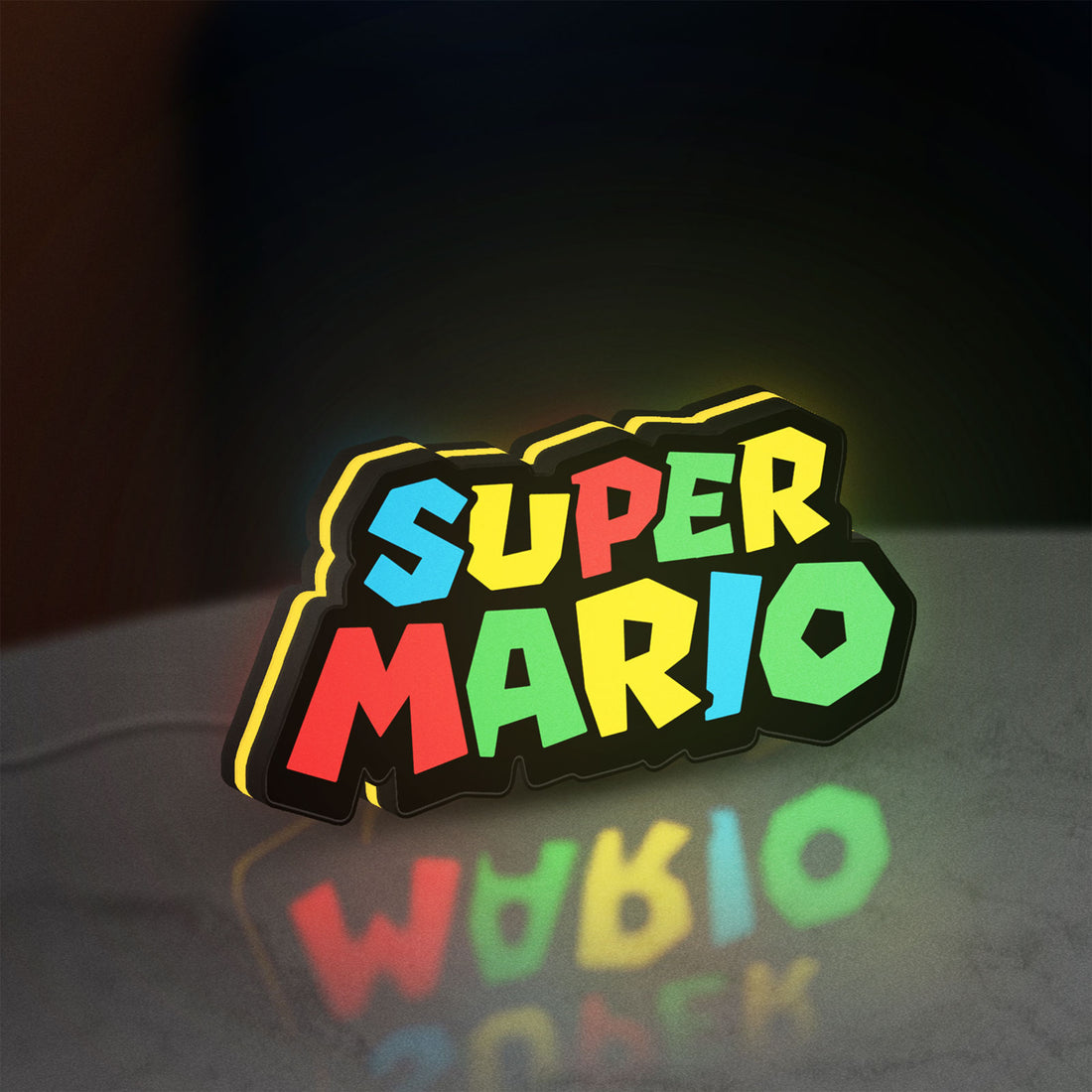 Super Mario LED lightbox hanging on a wall with yellow glow