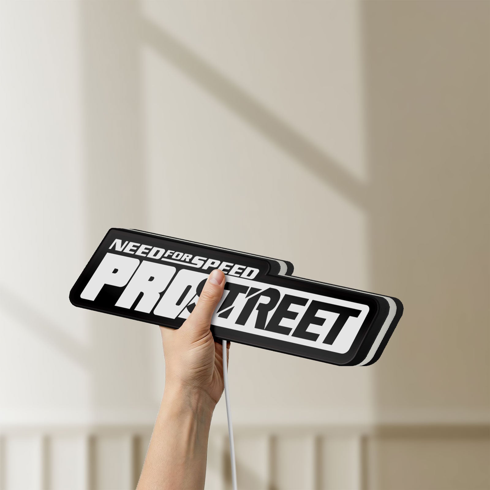 Unlit Need for Speed Prostreet Sign LED lightbox held by hand to show size and details
