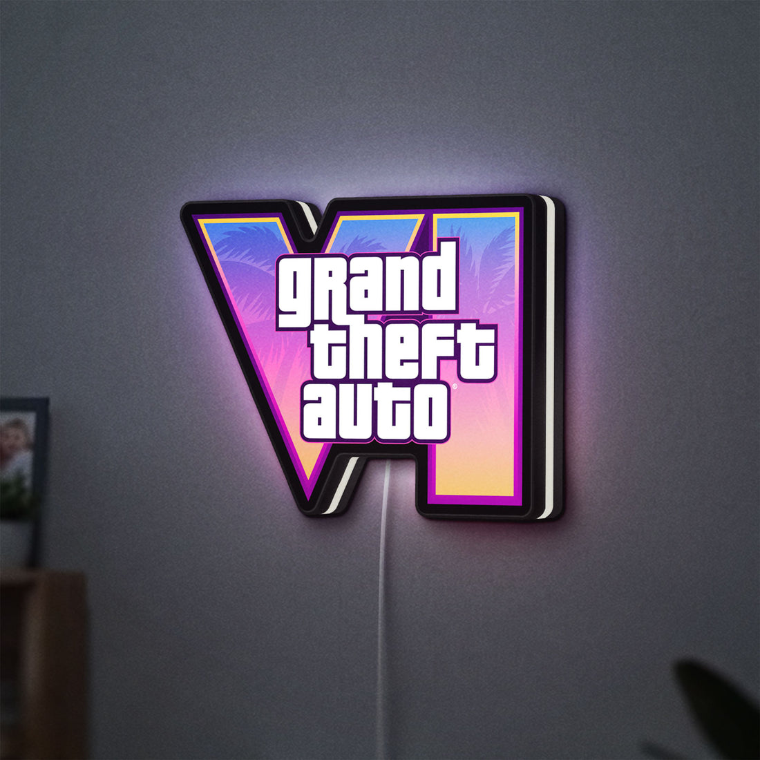 GTA VI LED lightbox hanging on a wall with white glow
