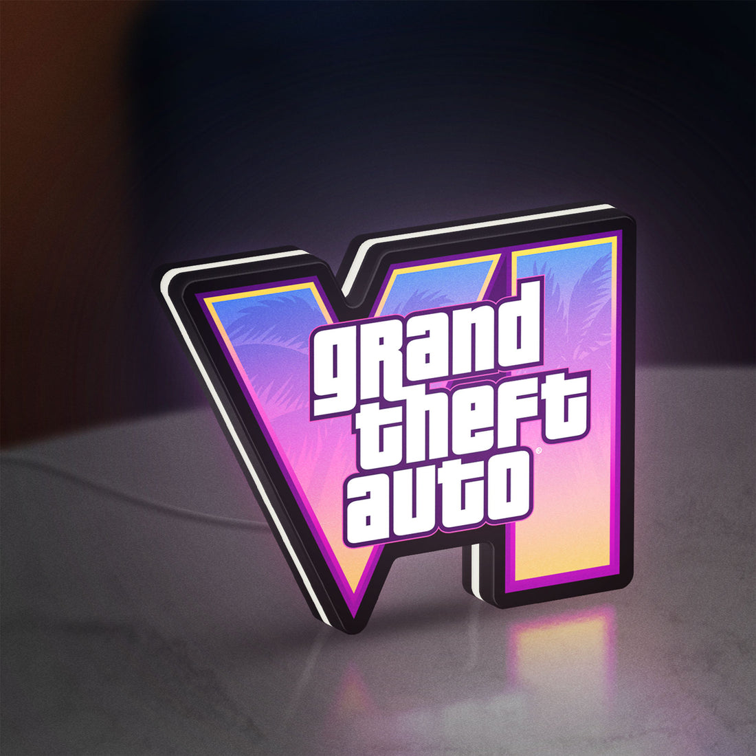 GTA VI LED lightbox hanging on a wall with white glow