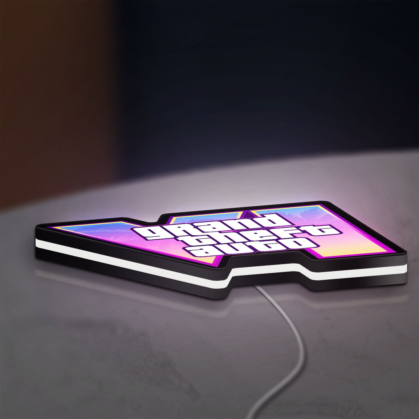 GTA VI LED lightbox lying flat on a desk with white glow