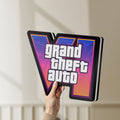 Unlit GTA VI LED lightbox held by hand to show size and details
