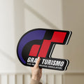 Unlit Gran Turismo LED lightbox held by hand to show size and details