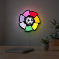 La Liga LED lightbox hanging on a room wall with soft white light
