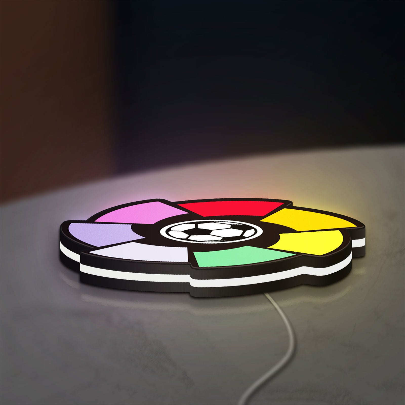 La Liga LED lightbox lying flat on a desk with white glow