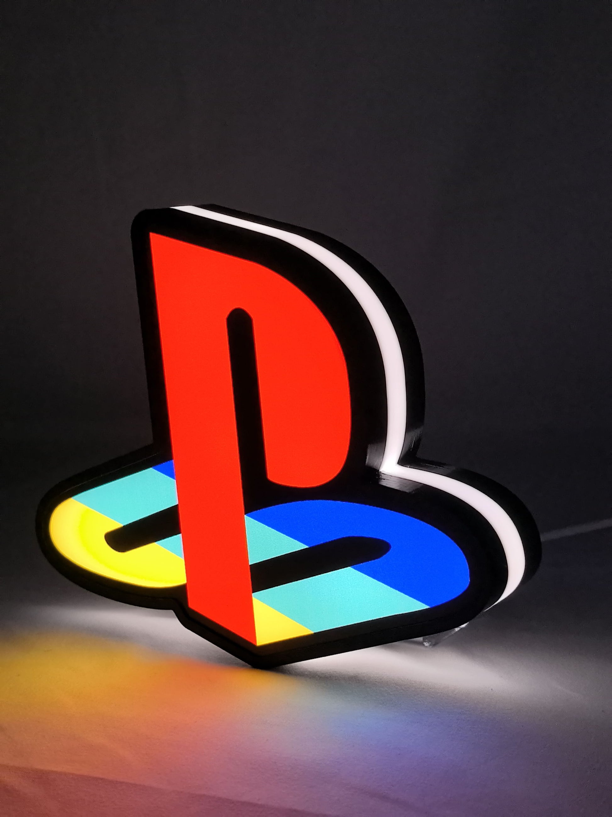 Playstation LED Sign (20cm) - Illuminated angled view standing, unique wall art for desk and room decor