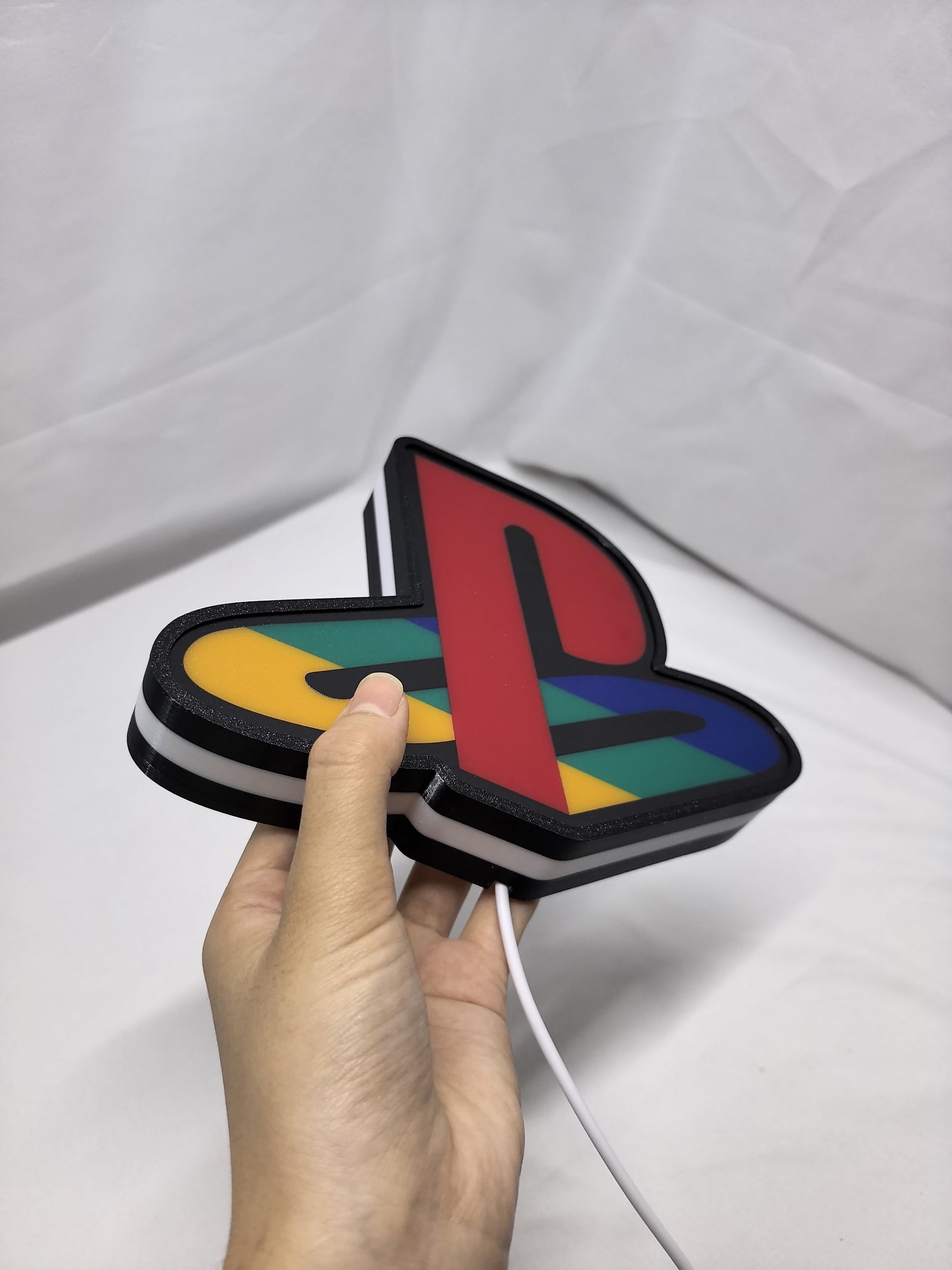 Unlit handheld size reference of Playstation 3D LED Sign in 20cm, unique wall art for desk and room decor
