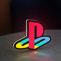 Playstation LED lightbox standing on a desk from an angled side view with white glow