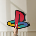 Unlit Playstation LED lightbox held by hand to show size and details