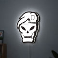 Call of Duty Black Ops LED lightbox hanging on a wall with white glow