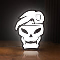 Front view of Call of Duty Black Ops LED lightbox sign glowing on a wooden desk
