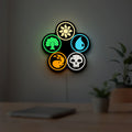 Magic The Gathering LED lightbox hanging on a room wall with soft yellow light
